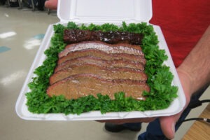 Learn how to cook competition brisket, pulled pork, chicken thighs and ribs.